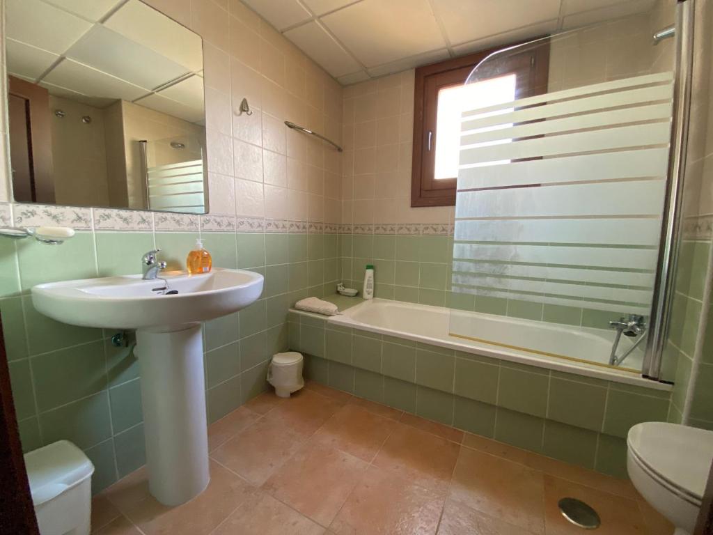 Kúpeľňa v ubytovaní CostaEsuri Vacaciones (Casa Marina)