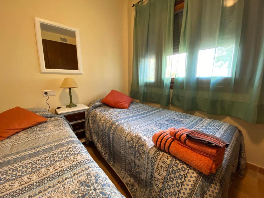 Posteľ alebo postele v izbe v ubytovaní CostaEsuri Vacaciones (Casa Marina)