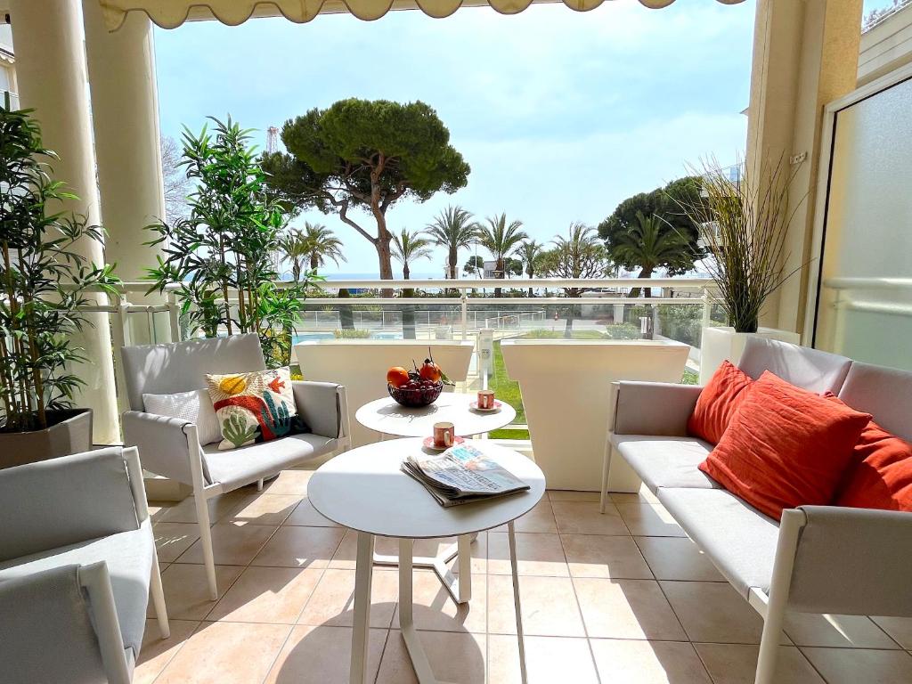 Een balkon of terras bij L&#39;appartement Royal Palm