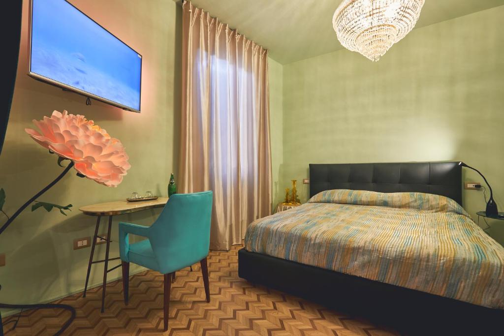 Postel nebo postele na pokoji v ubytování Le Stagioni Luxury Suite