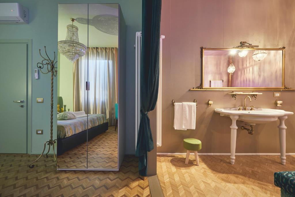 Postel nebo postele na pokoji v ubytování Le Stagioni Luxury Suite
