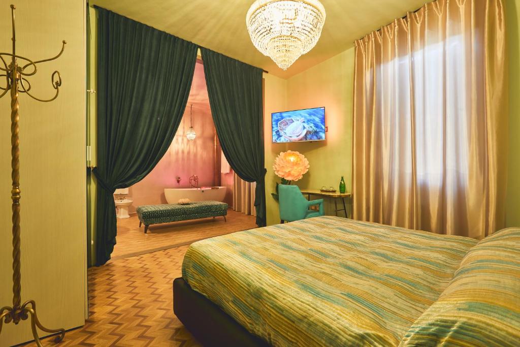 Postel nebo postele na pokoji v ubytování Le Stagioni Luxury Suite