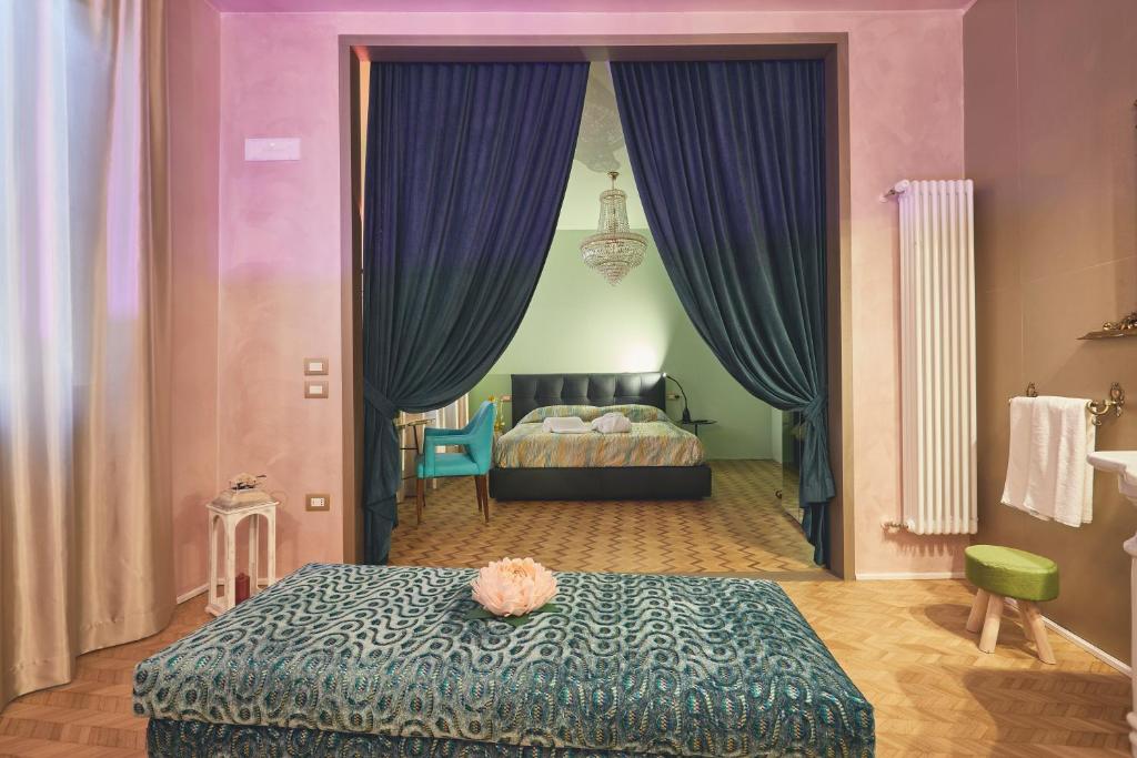 Postel nebo postele na pokoji v ubytování Le Stagioni Luxury Suite