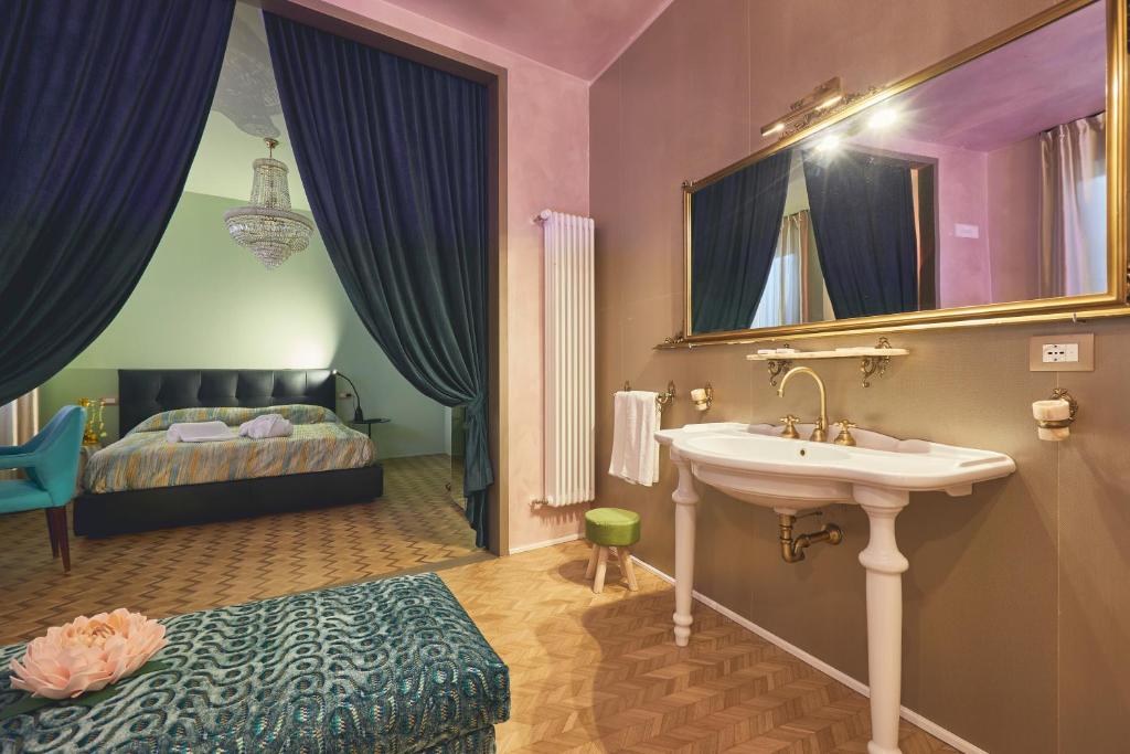 Postel nebo postele na pokoji v ubytování Le Stagioni Luxury Suite