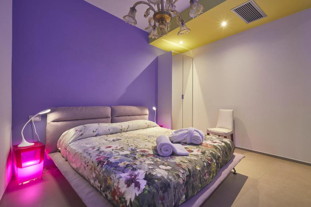 Postel nebo postele na pokoji v ubytování Le Stagioni Luxury Suite