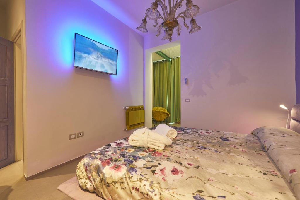 Postel nebo postele na pokoji v ubytování Le Stagioni Luxury Suite
