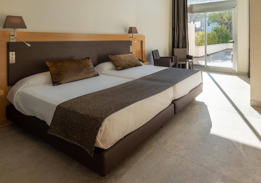 Postel nebo postele na pokoji v ubytování Gran Palas Hotel - Spa incluido
