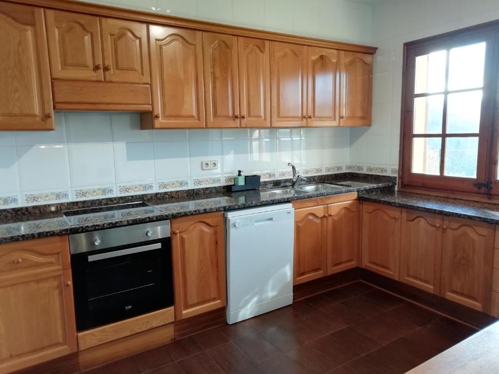 Kuchyň nebo kuchyňský kout v ubytování La Casa de les Oques