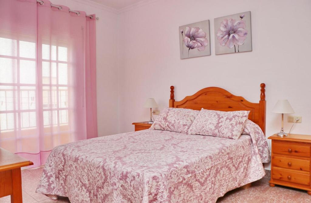 Posteľ alebo postele v izbe v ubytovaní Apartamento Violeta Conil