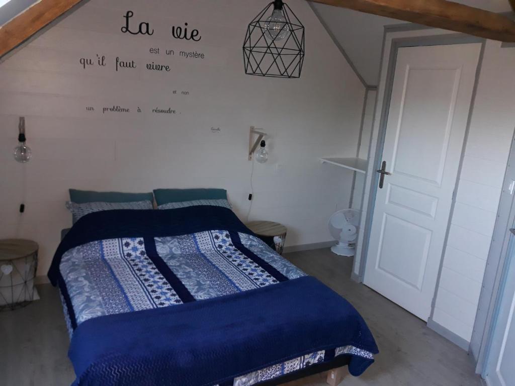 Postel nebo postele na pokoji v ubytování Au Ker Lauriers chambres et table d Hôtes
