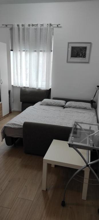 Postel nebo postele na pokoji v ubytování Astralis Factory Apartments- Šenoa
