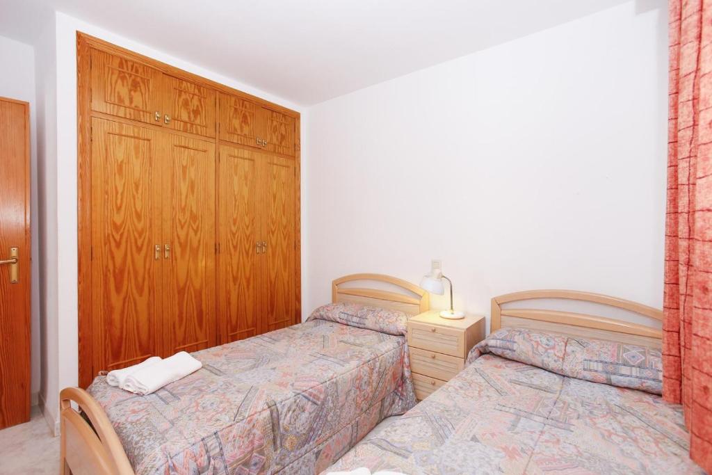 Postel nebo postele na pokoji v ubytování 167 Talima C-3-B - Deniasol