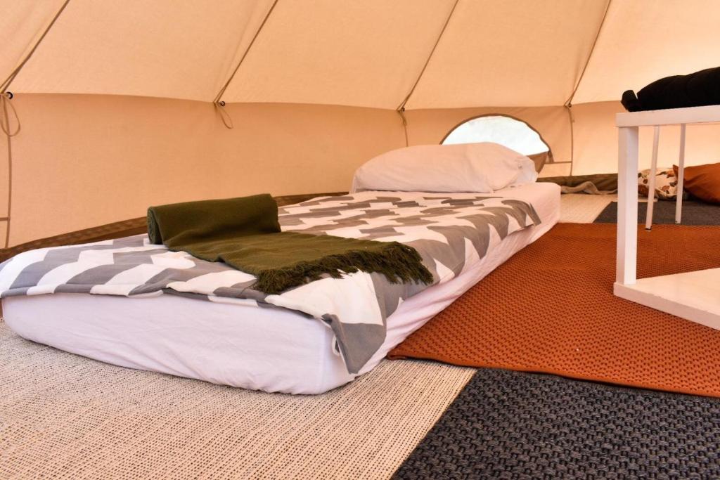 a large bed sitting inside of a tent at BELLTENT SAVICA in Zagreb