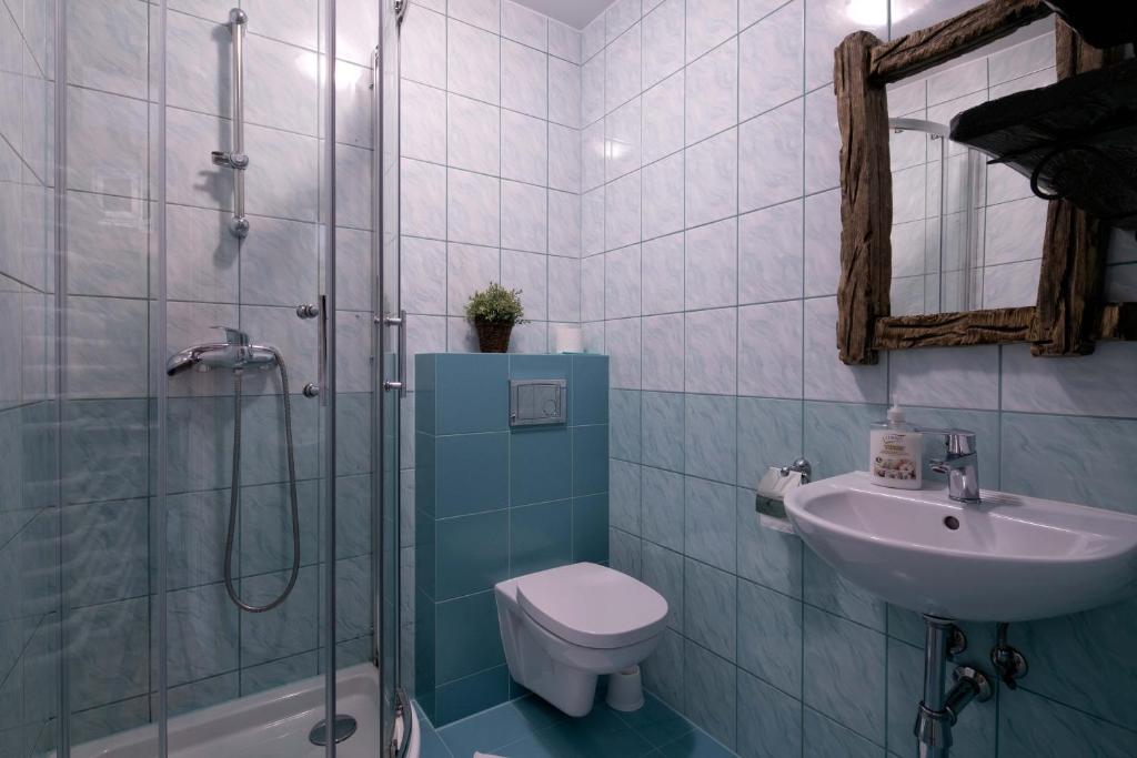 Kúpeľňa v ubytovaní Pokoje gościnne Borowy