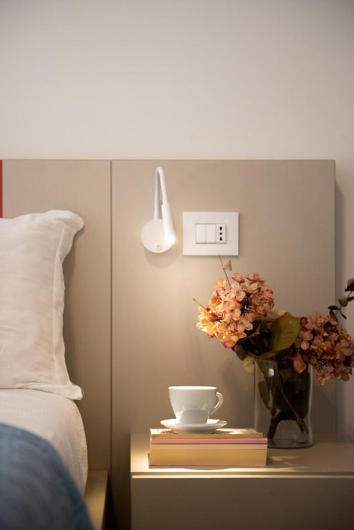 Łóżko lub łóżka w pokoju w obiekcie Casole Living B&B