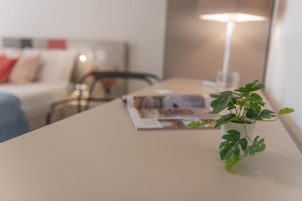 Łóżko lub łóżka w pokoju w obiekcie Casole Living B&B
