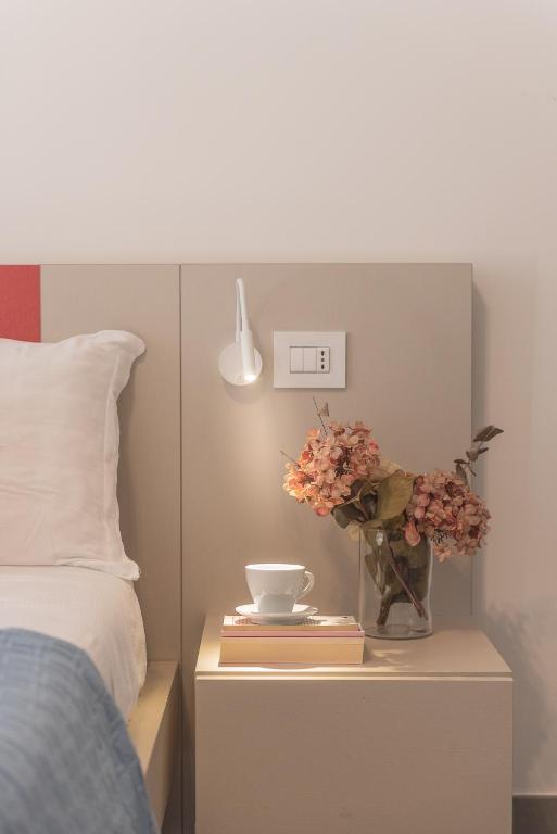 Łóżko lub łóżka w pokoju w obiekcie Casole Living B&B