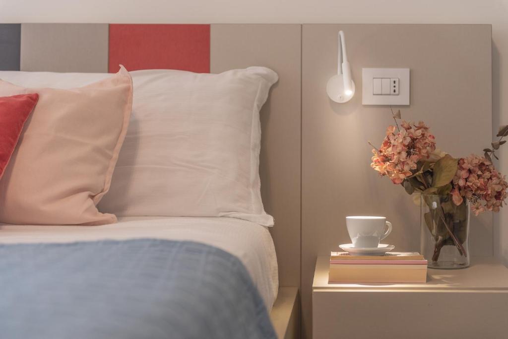 Łóżko lub łóżka w pokoju w obiekcie Casole Living B&B