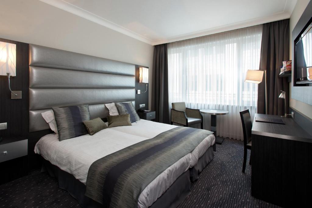 Postel nebo postele na pokoji v ubytování Best Western Hotel Royal Centre
