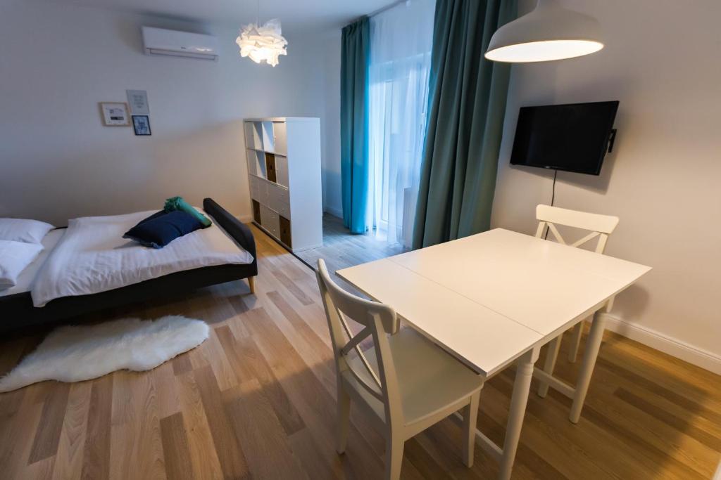 Łóżko lub łóżka w pokoju w obiekcie Lubi Lodge