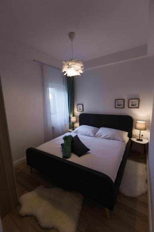 Łóżko lub łóżka w pokoju w obiekcie Lubi Lodge