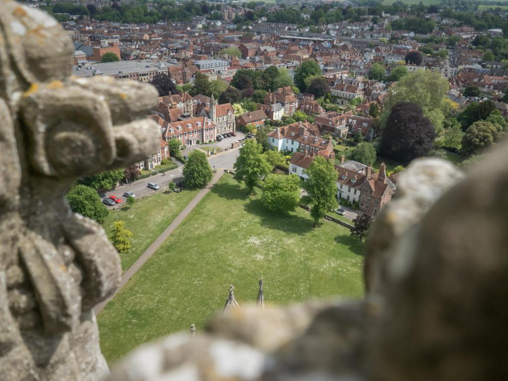 a view of a city from the top of a statue at Sarum College in Salisbury