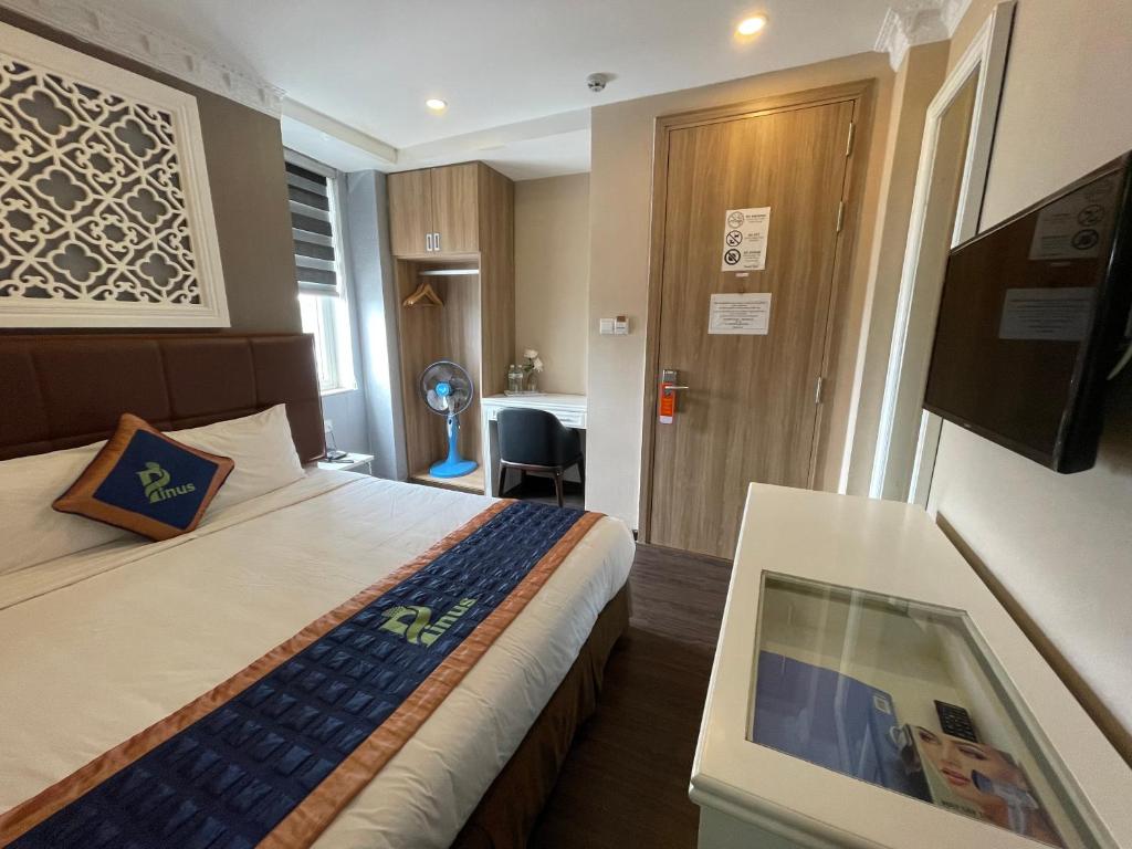 Postel nebo postele na pokoji v ubytování Pinus Hotel