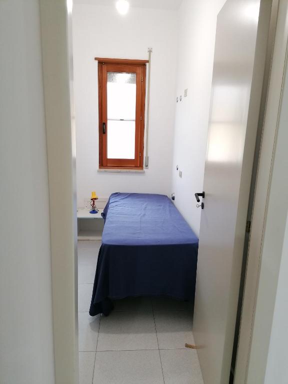 Postel nebo postele na pokoji v ubytování BeB ISIDE
