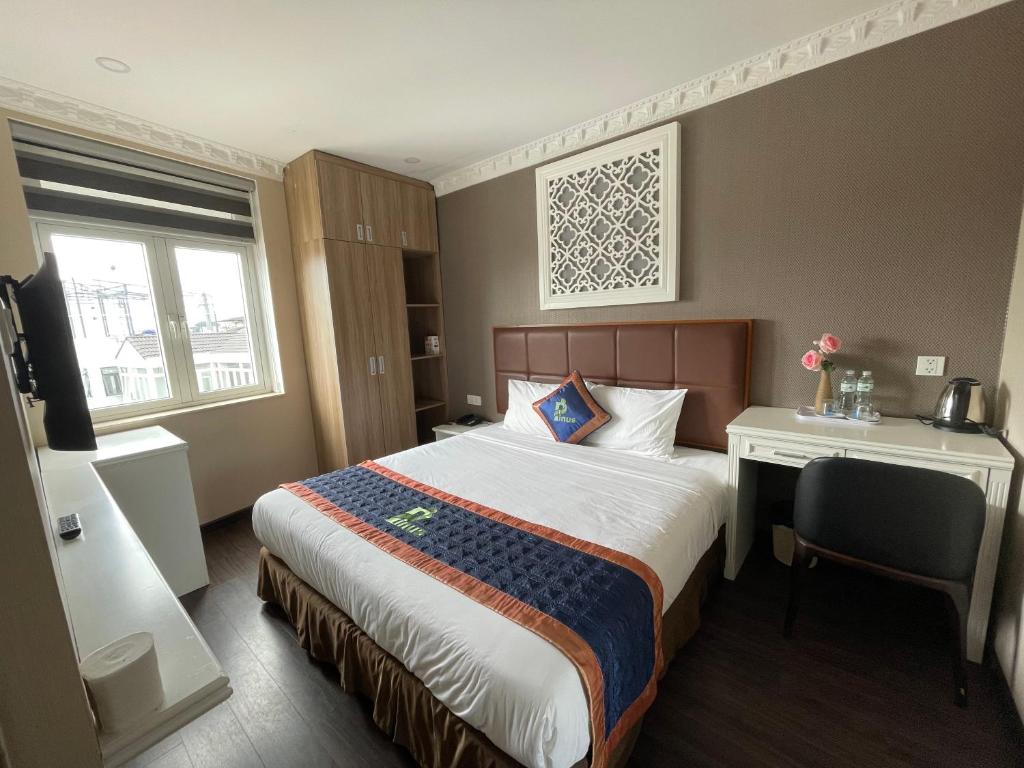 Postel nebo postele na pokoji v ubytování Pinus Hotel