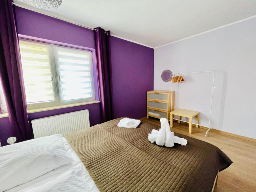 Posteľ alebo postele v izbe v ubytovaní Villa Park by Baltic Home