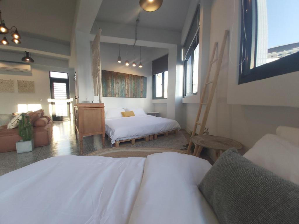Postel nebo postele na pokoji v ubytování Huck B&B