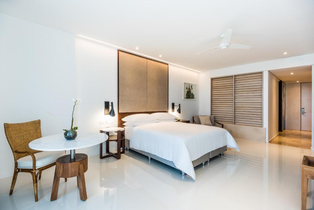 Postel nebo postele na pokoji v ubytování Dreams Karibana Cartagena Golf & Spa Resort