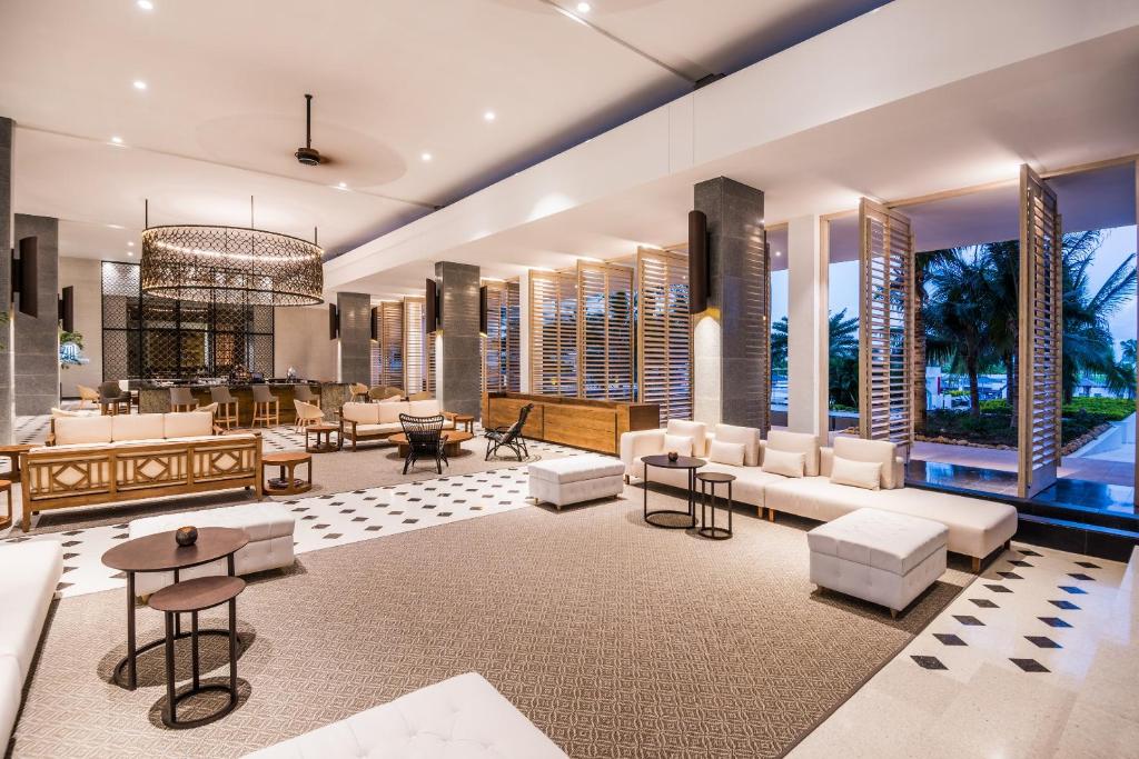 Posezení v ubytování Dreams Karibana Cartagena Golf & Spa Resort