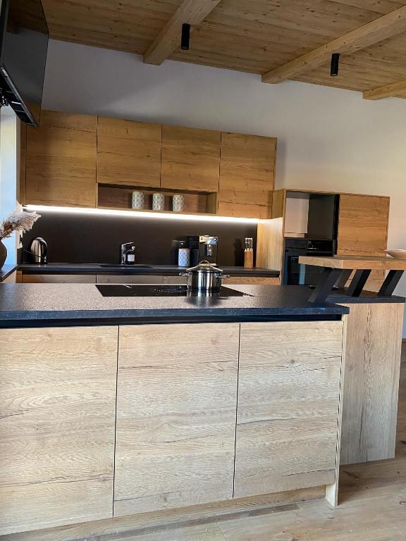 Kuchyň nebo kuchyňský kout v ubytování Chalet Tuxer