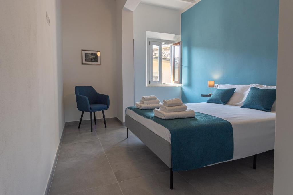 Posteľ alebo postele v izbe v ubytovaní Casa Raffaello