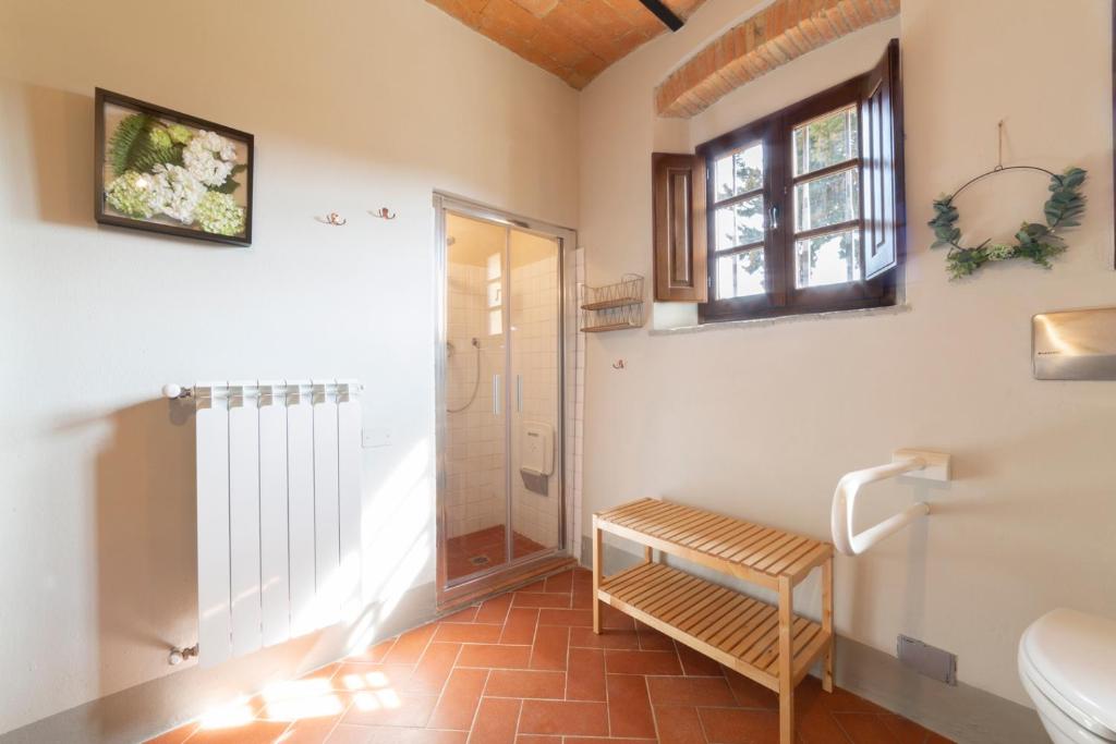 Posteľ alebo postele v izbe v ubytovaní Torre di Polvereto