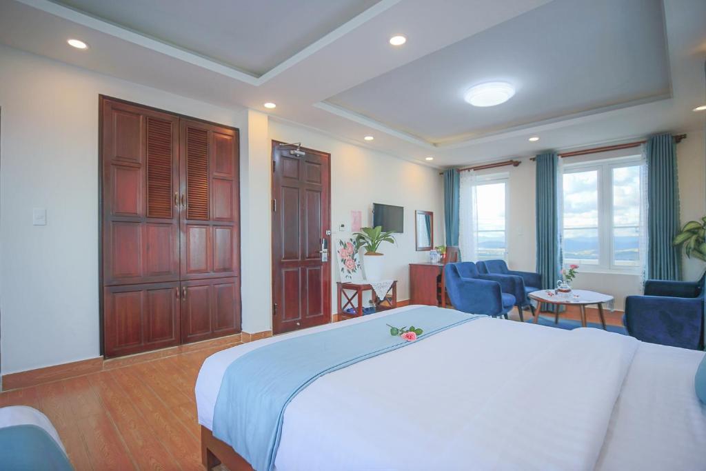 Giường trong phòng chung tại Rose Valley Hotel Da Lat Vietnam