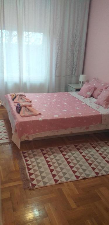 Postel nebo postele na pokoji v ubytování Apartment Gajic