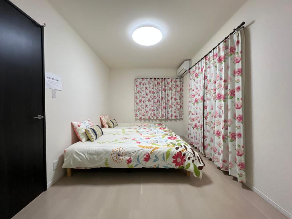 Letto o letti in una camera di Nara Guesthouse Kaede