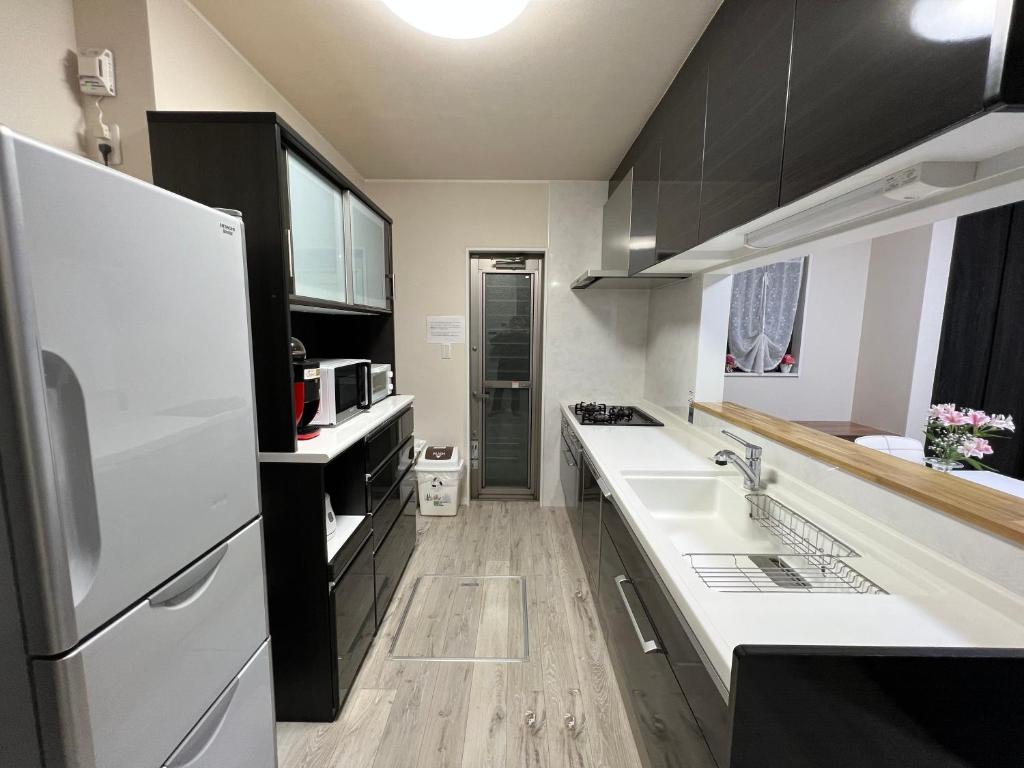 Cucina o angolo cottura di Nara Guesthouse Kaede