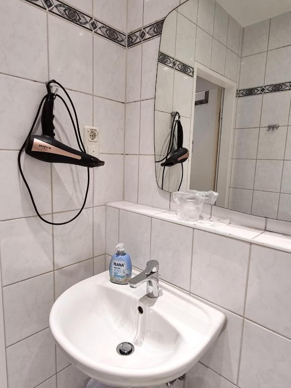 Koupelna v ubytování Adler Hotel Frankfurt