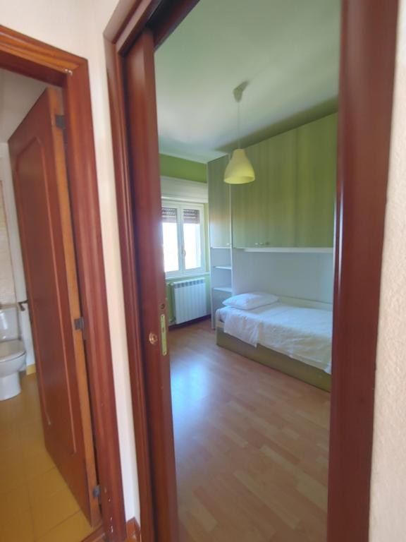 Posteľ alebo postele v izbe v ubytovaní THE ATTICO MILAZZO