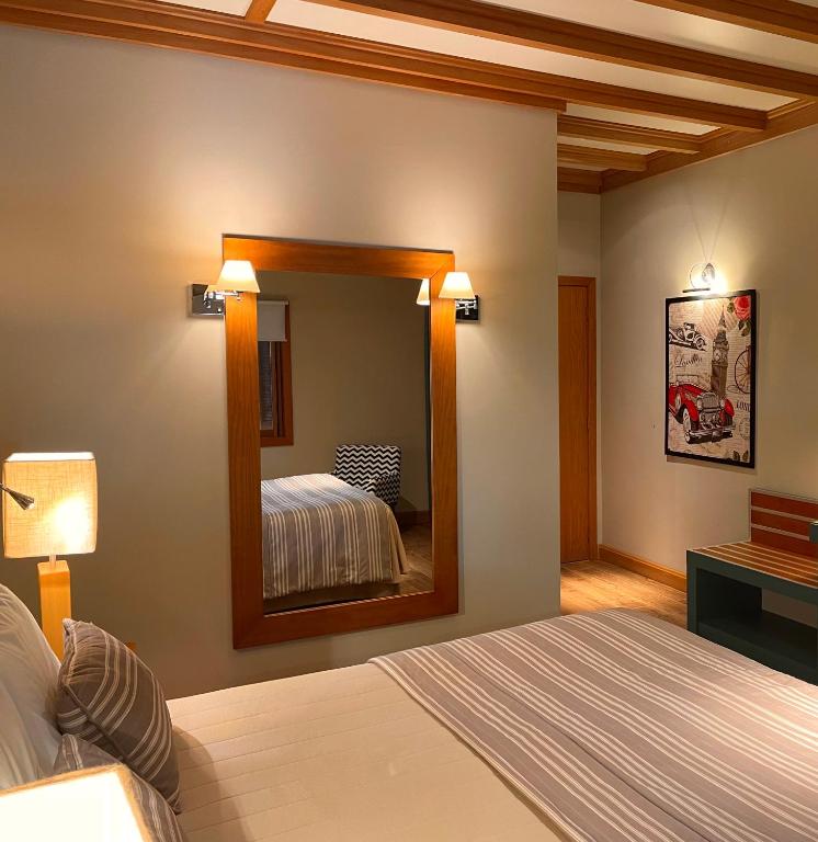Postel nebo postele na pokoji v ubytování Hotel Boutique Britanico