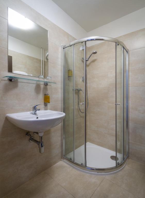 Koupelna v ubytování Hotel Harmony