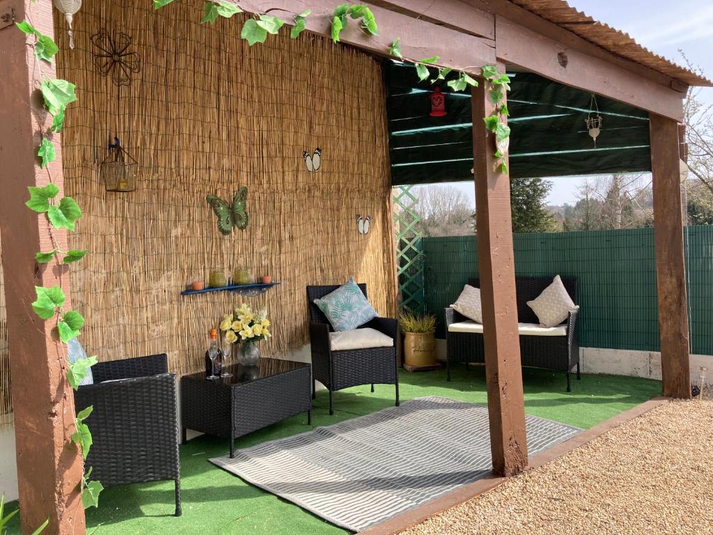 Patio nebo venkovní prostory v ubytování La Maison Bleue