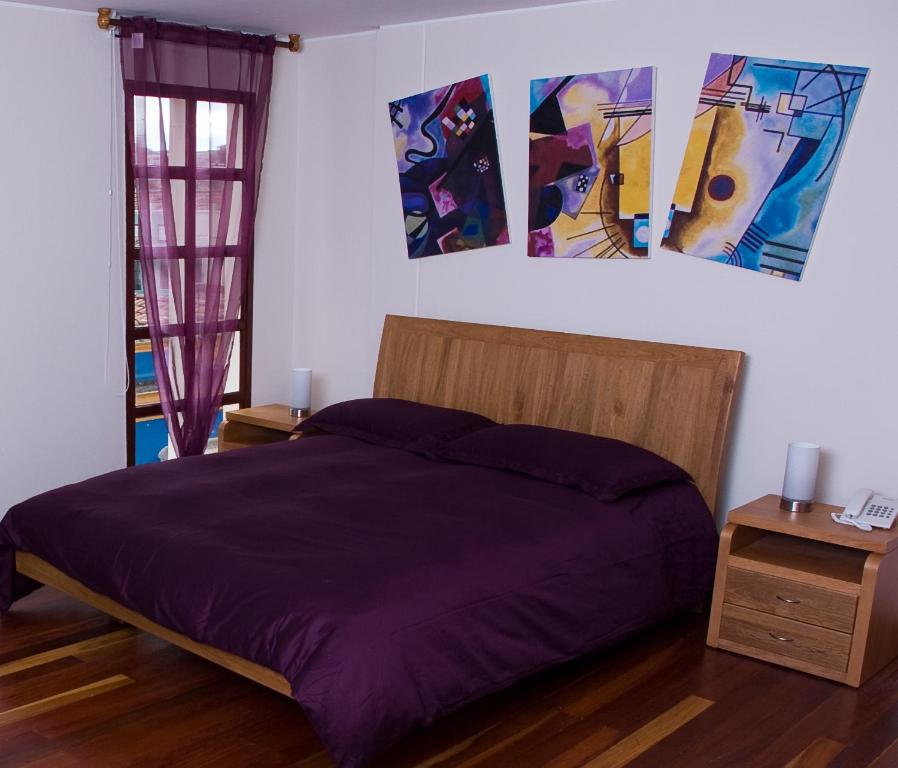 Postel nebo postele na pokoji v ubytování Hotel Casa Deco