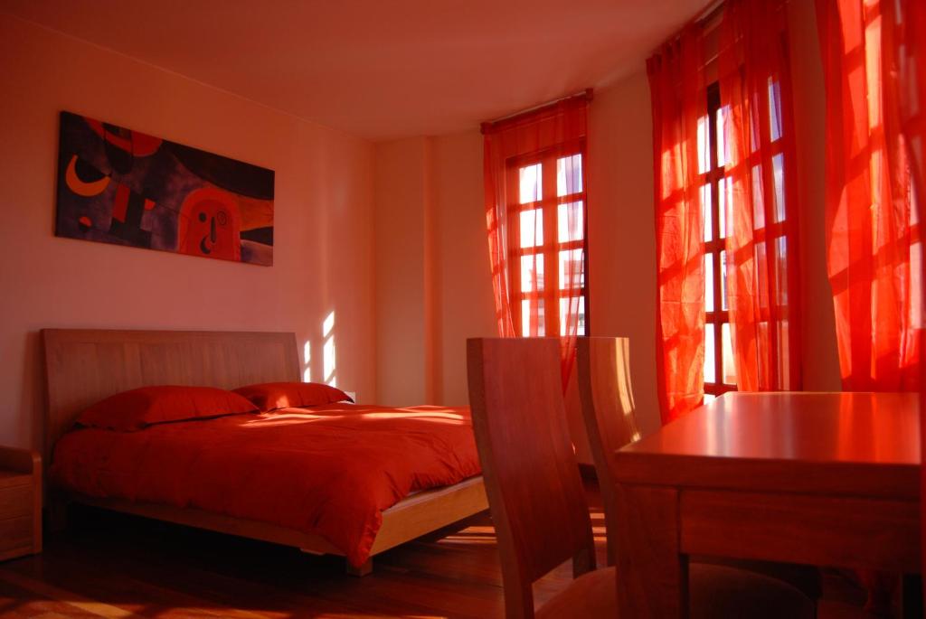 Postel nebo postele na pokoji v ubytování Hotel Casa Deco