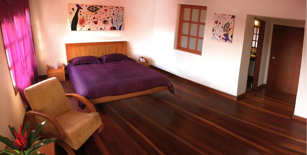Postel nebo postele na pokoji v ubytování Hotel Casa Deco