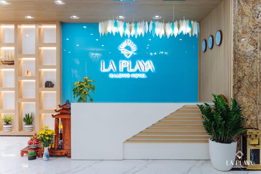 a lobby of la plume international hotel at La Playa Ha Long Hotel in Ha Long