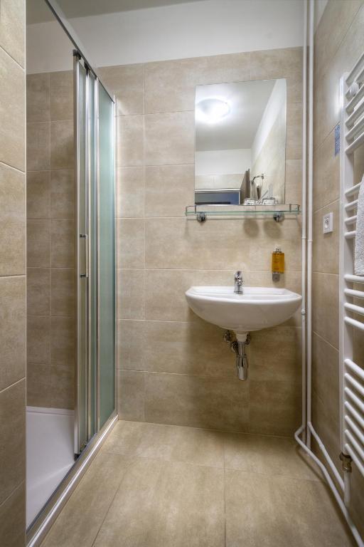 Koupelna v ubytování Hotel Harmony